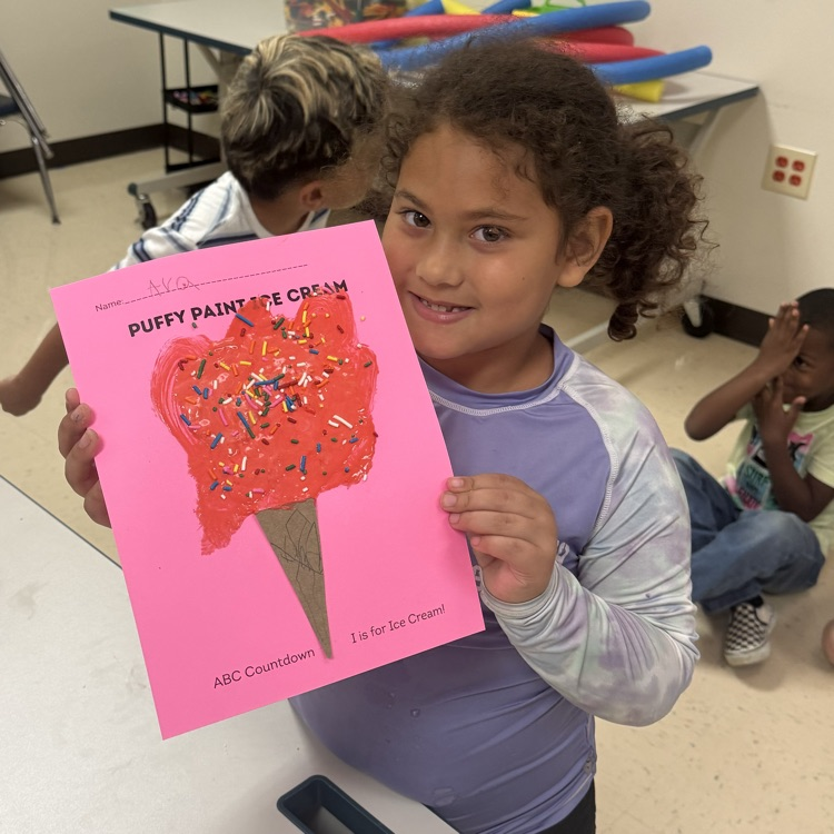 students doing a puffy paint ice cream craft