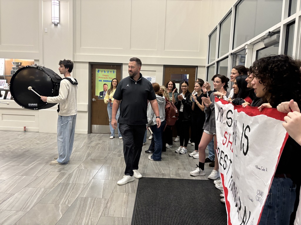 Tyler Legacy students giving Sherman a big Red Raider welcome when he got to school this morning