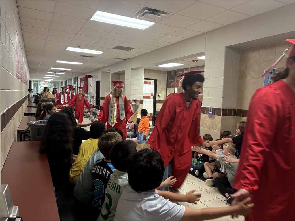 Tyler Legacy seniors at Rice ES for grad walks