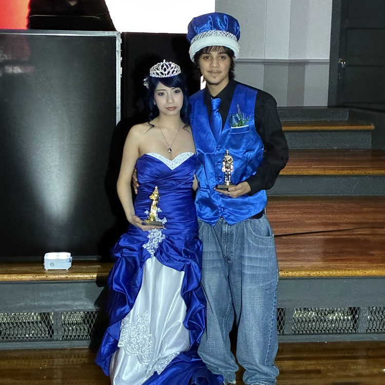 students with trophies