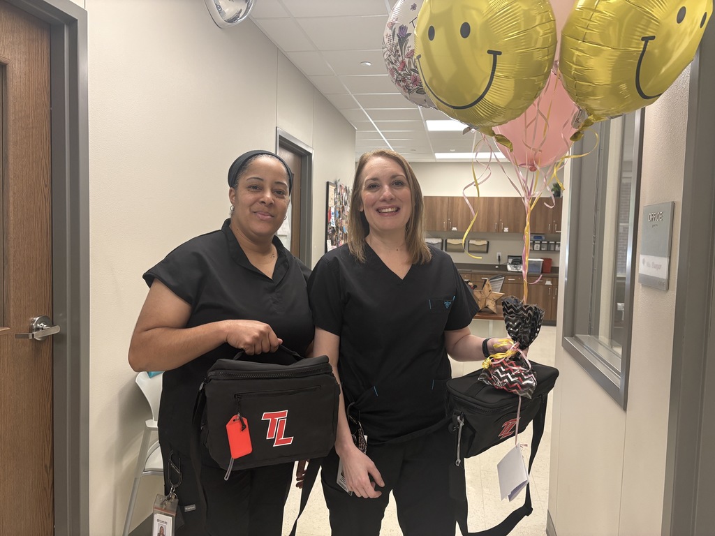 Tyler Legacy Nurses with lunch boxes and balloons for nurse appreciation day