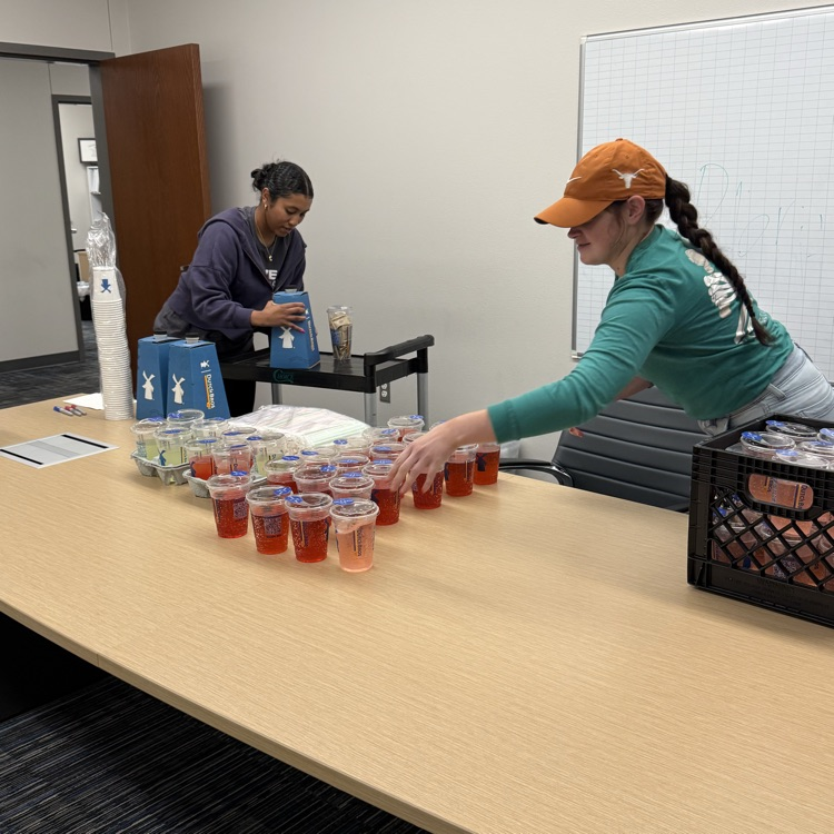 ladies setting up coffee and drinks