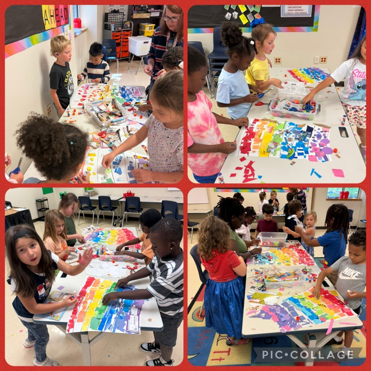 students working on a rainbow mural scrap paper project