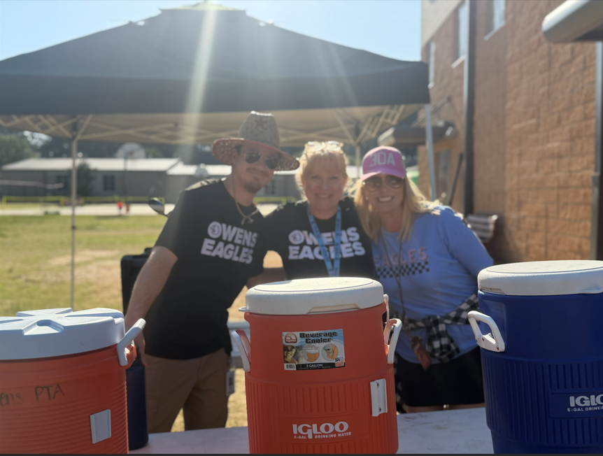 Teachers around the water station.