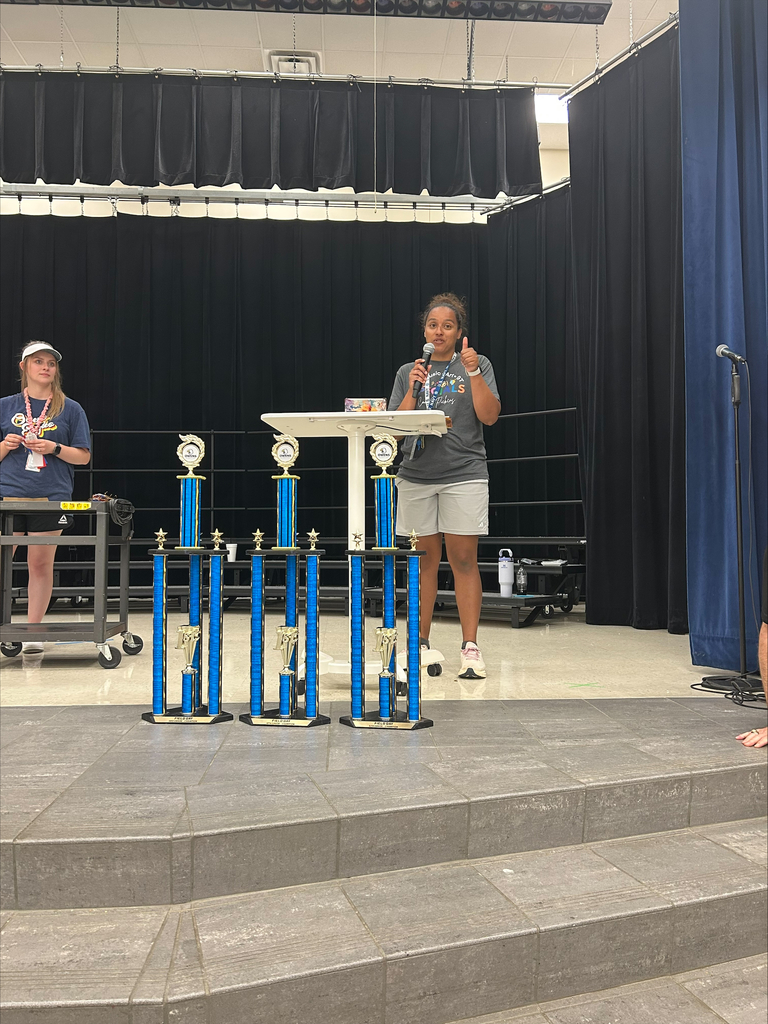 Coach announcing awards.
