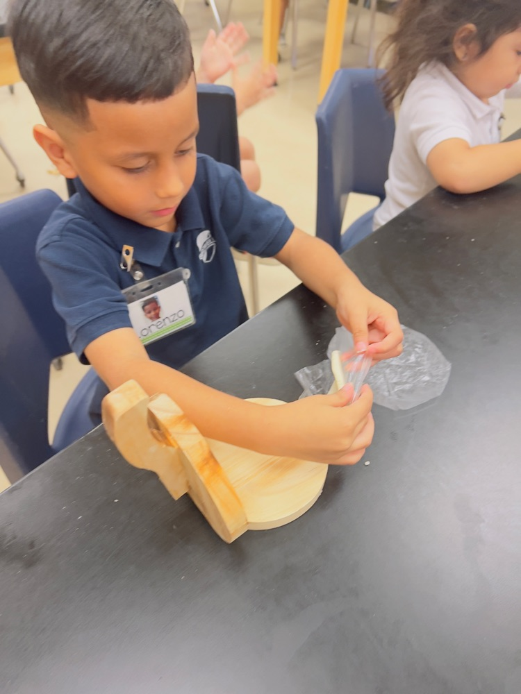 kids making tortillas