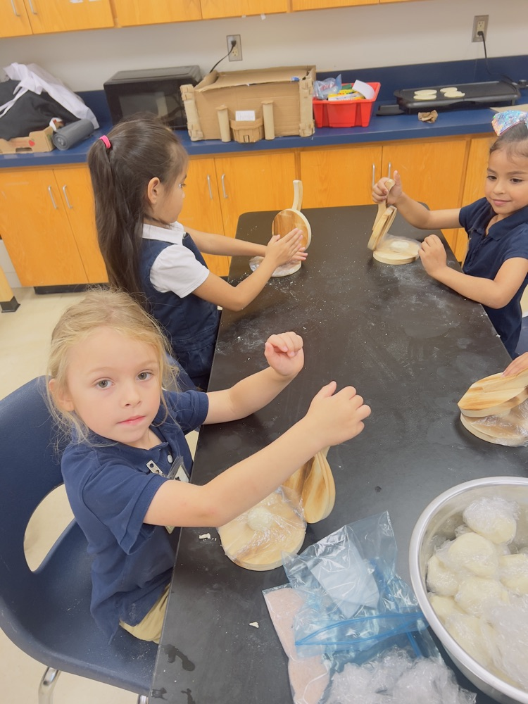 kids making tortillas