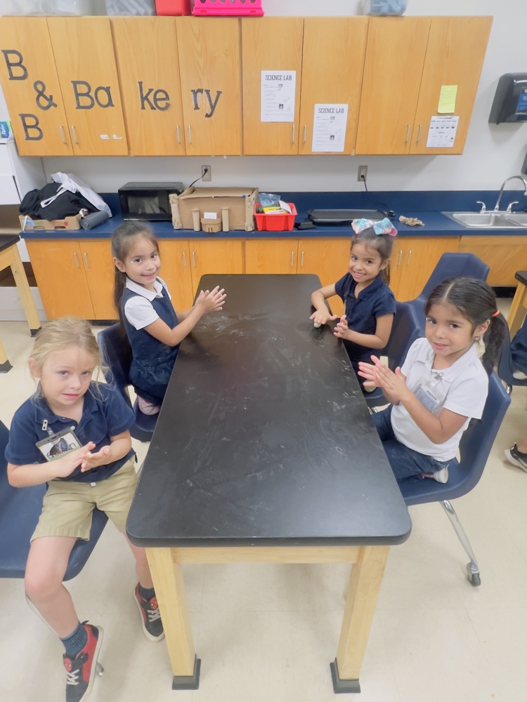 kids making tortillas
