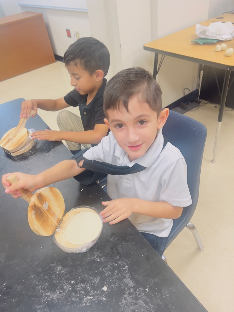 kids making tortillas