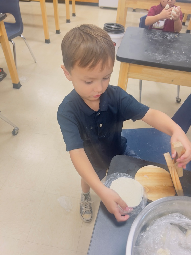 kids making tortillas