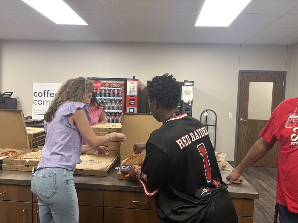 Tyler Legacy PTA in the mailroom with pizza for staff