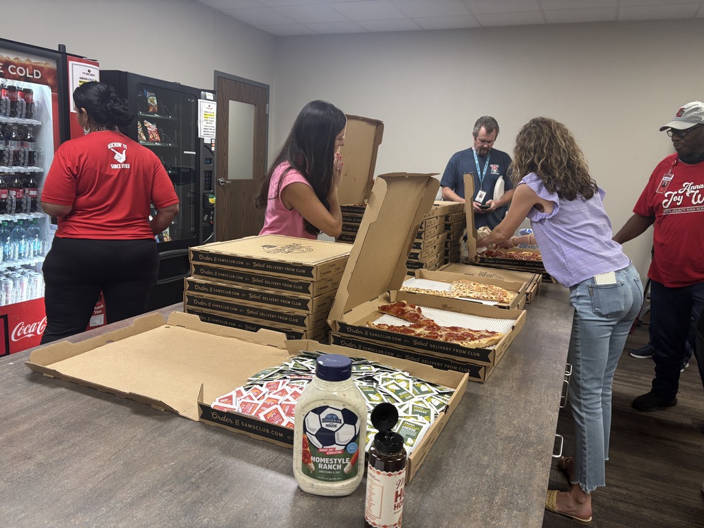 Tyler Legacy PTA in the mailroom with pizza for staff