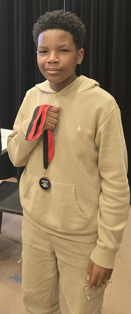 Donovan, 3rd place winner for district chess tournament.