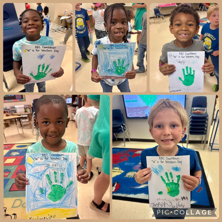 students completing a hand print cactus craft