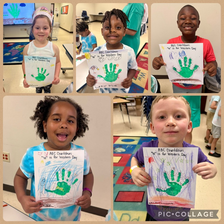 students completing a hand print cactus craft