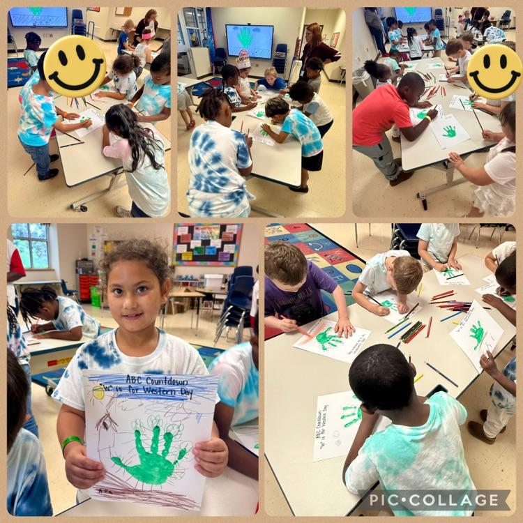 students completing a hand print cactus craft
