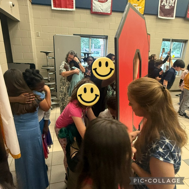 students signing their names on the back of C E S letters