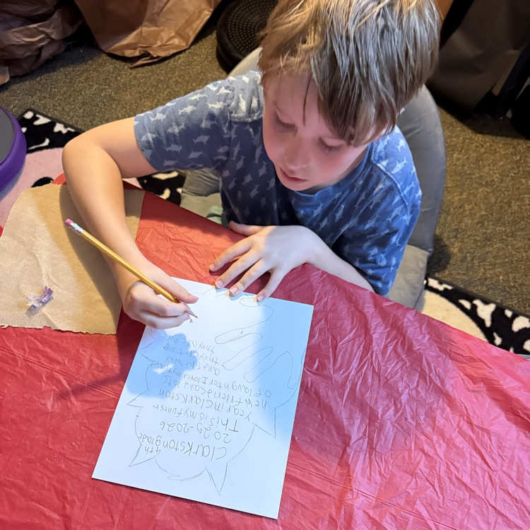 Student writing about fire safety