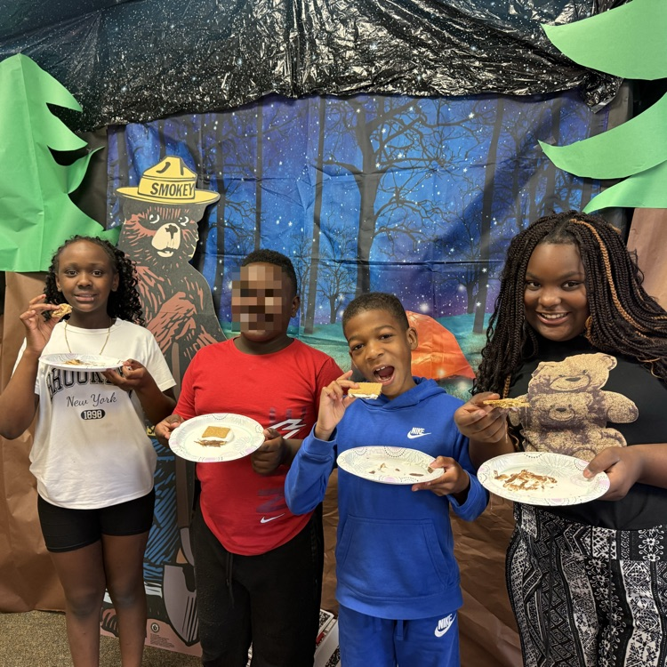Students eating s’mores and camping room transformation