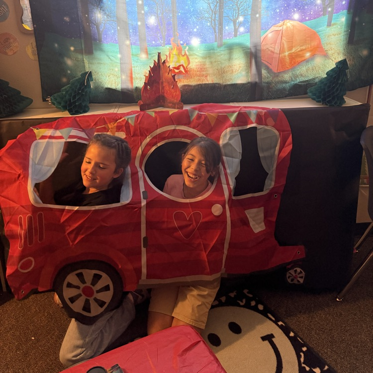 Students in a camper in camping room transformation