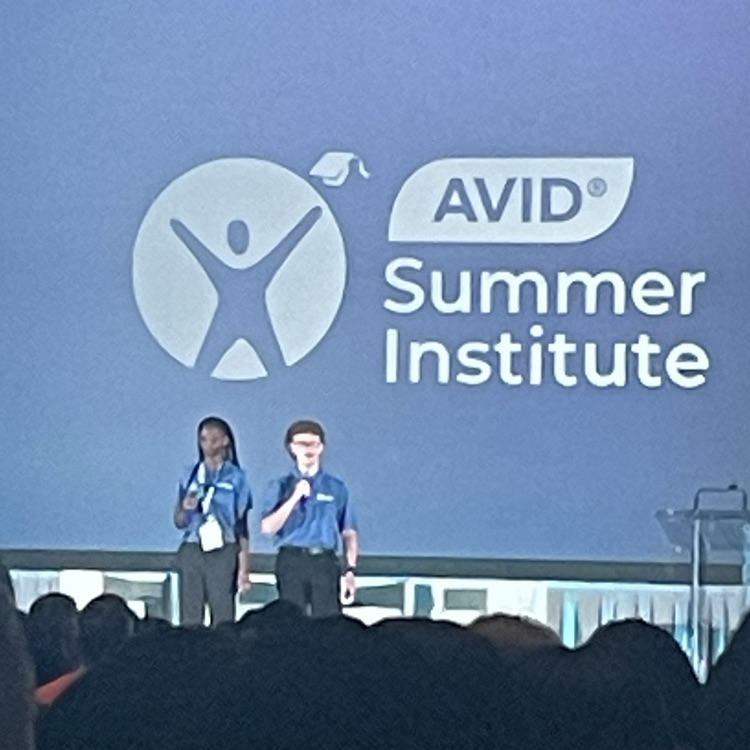speakers on stage