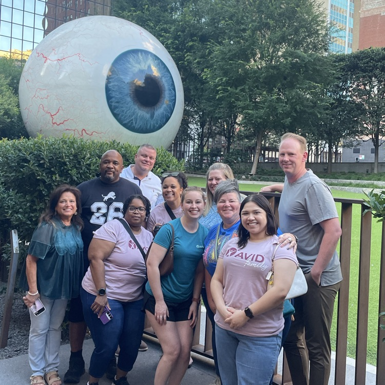 people in front of the big eye