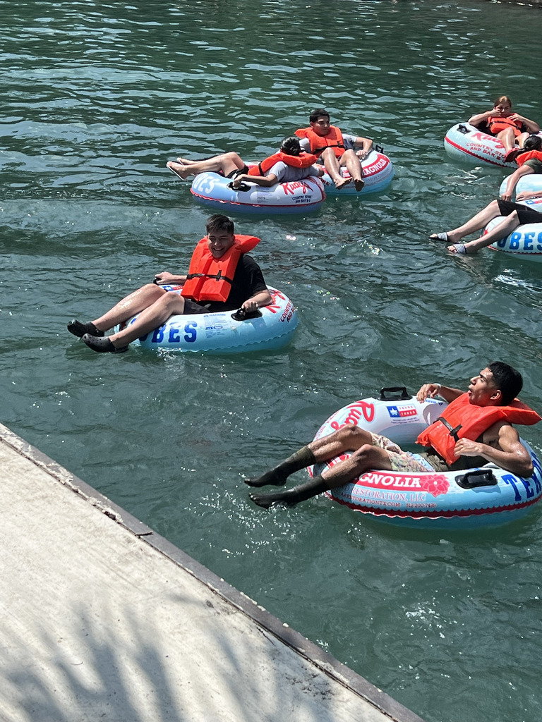 kids floating on floats