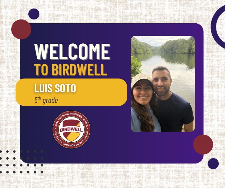 luis soto and wife in front of a lake