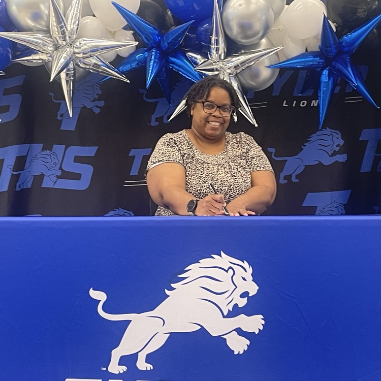 teacher signing