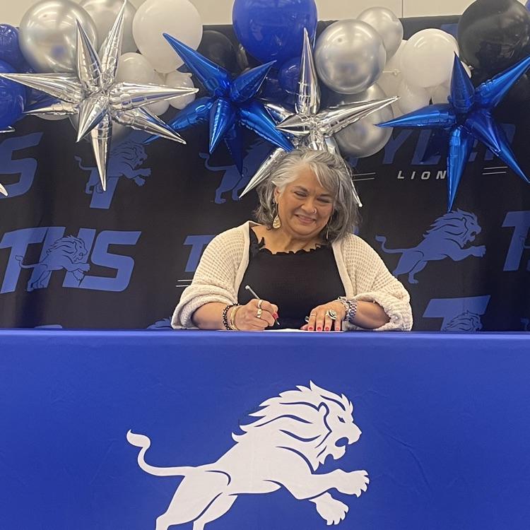 teacher signing