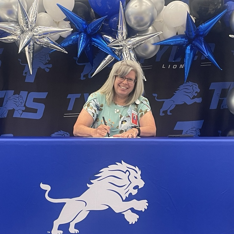 teacher signing