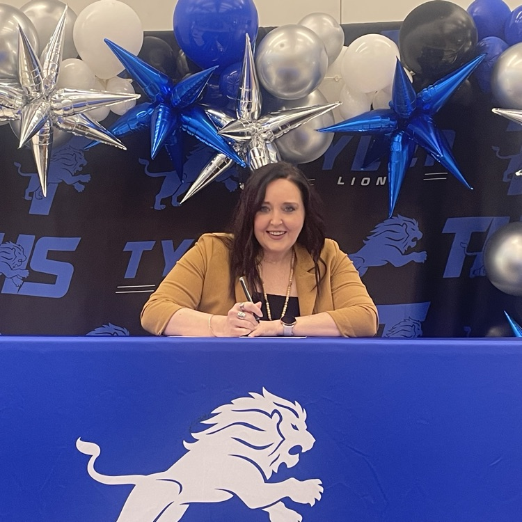 teacher signing