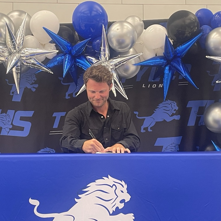 teacher signing