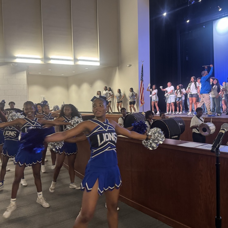 cheerleaders and band