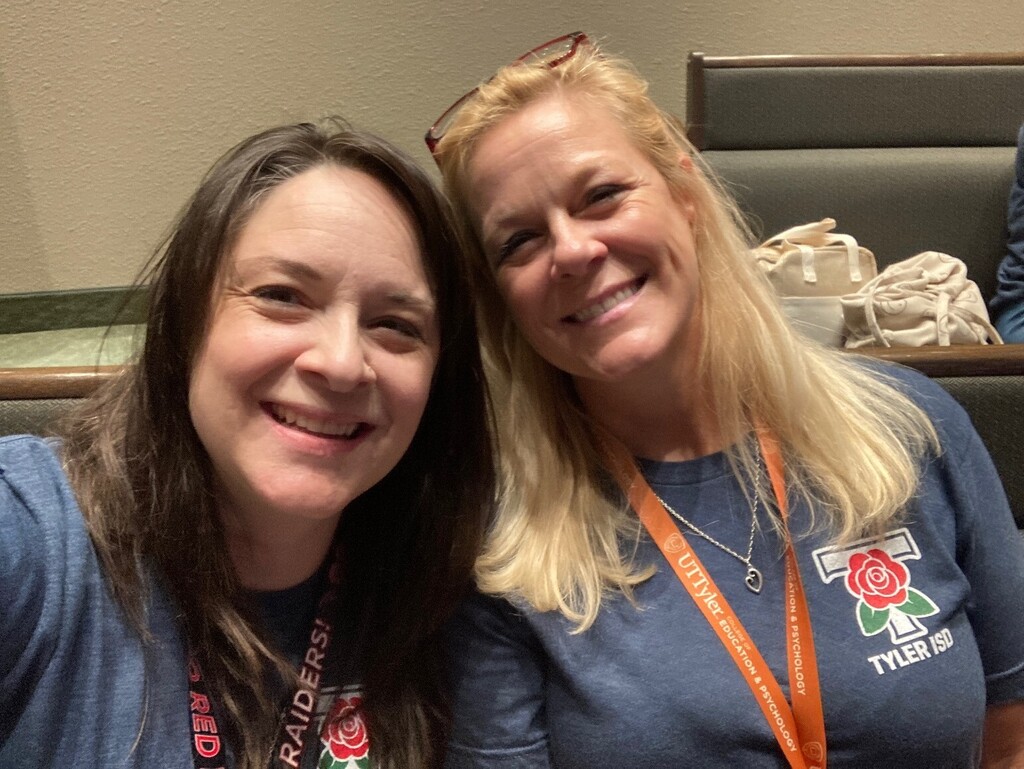 staff members smiling at convocation 2026