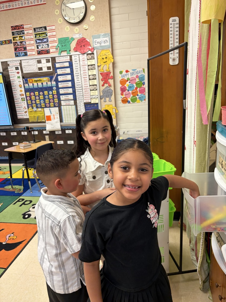 girls and boy in classroom