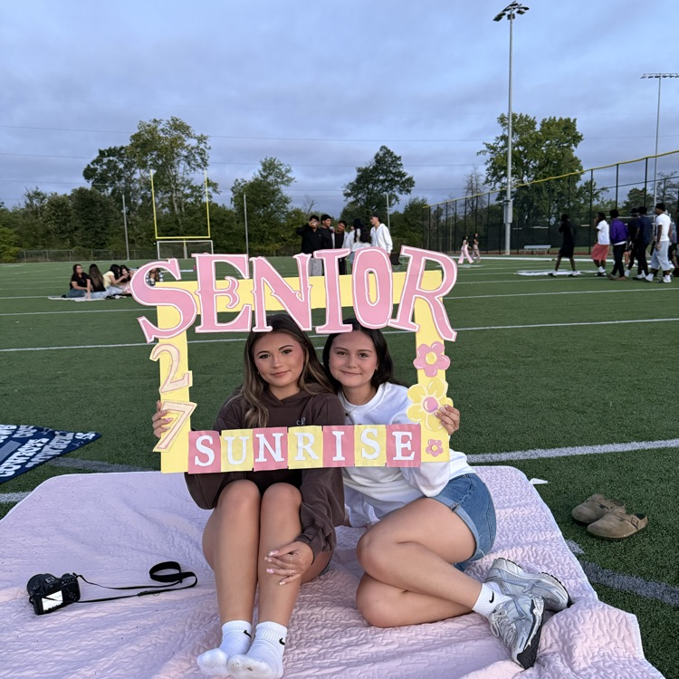 girls with a sign