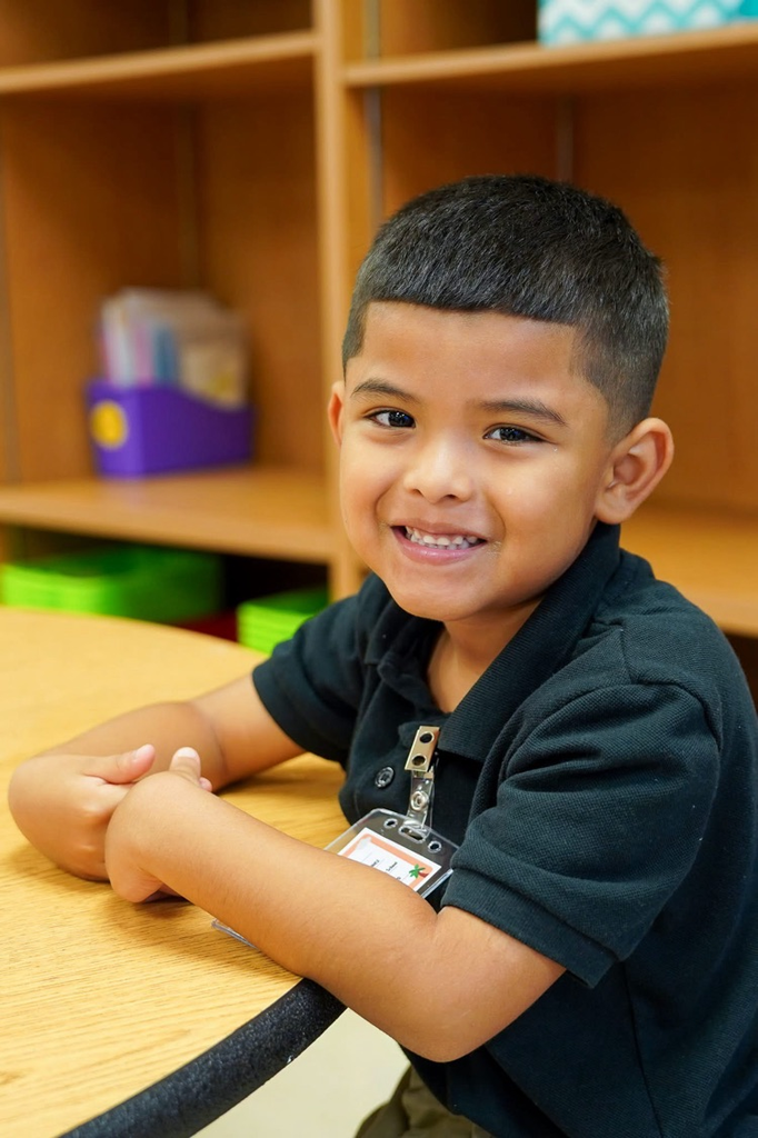 kid at desk