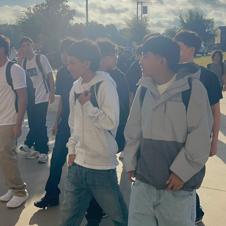 students walking into school