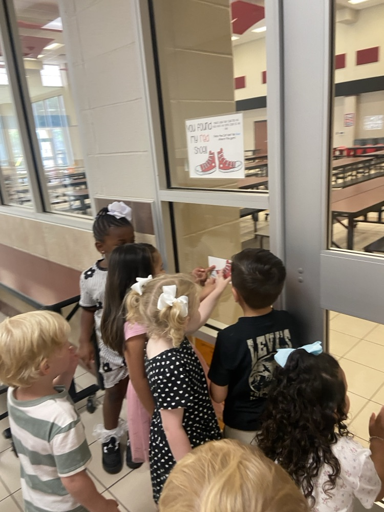 Kids on a scavenger hunt.
