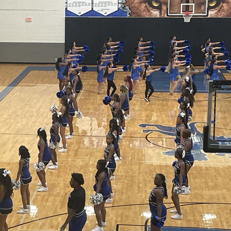 cheerleaders on floor
