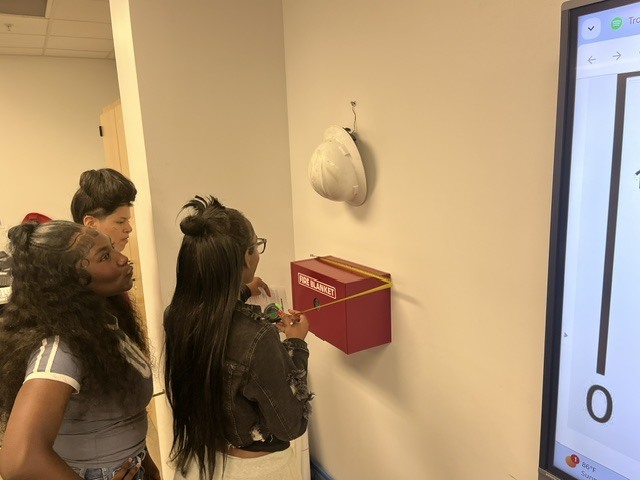 students measuring