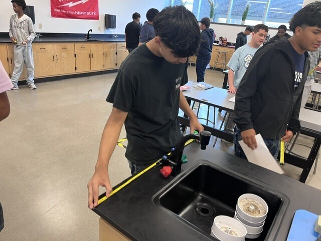 students measuring