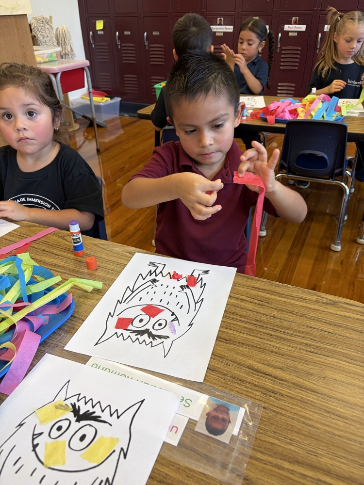 student coloring at table
