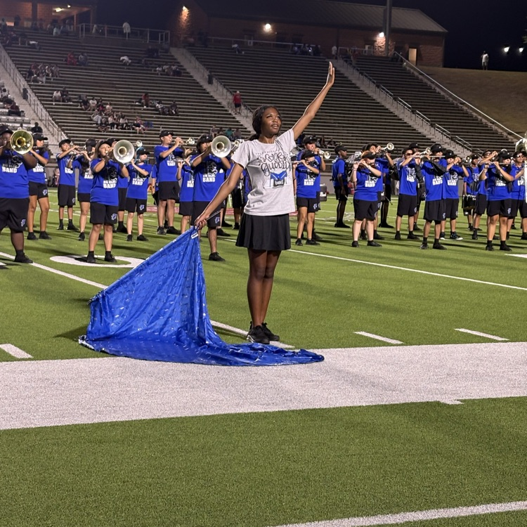 band and flag corp performing on the field