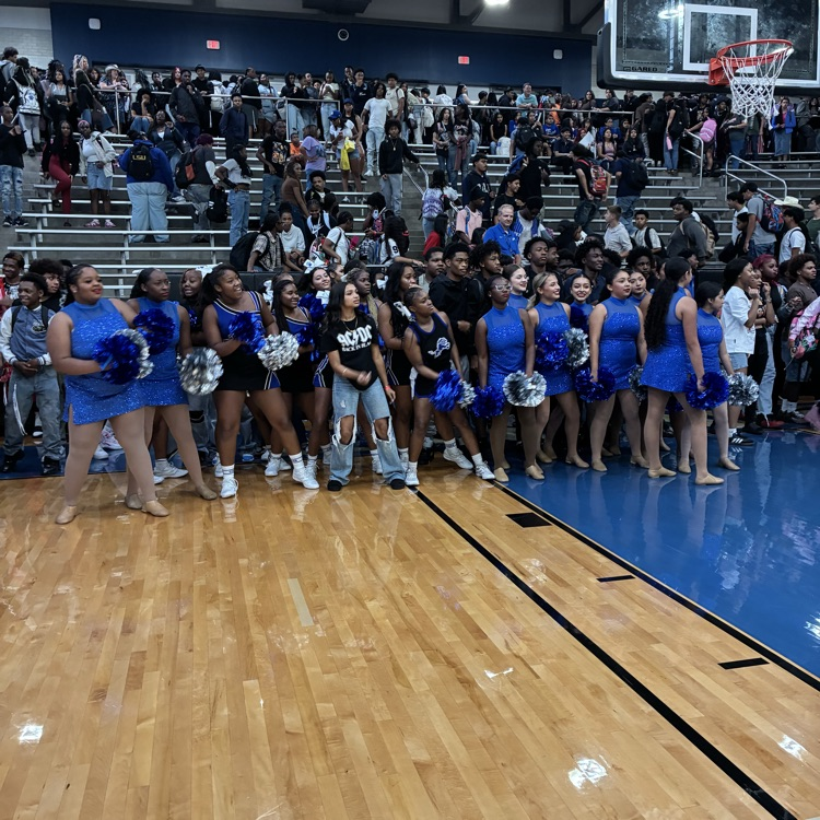 students on the court doing the grade level chant