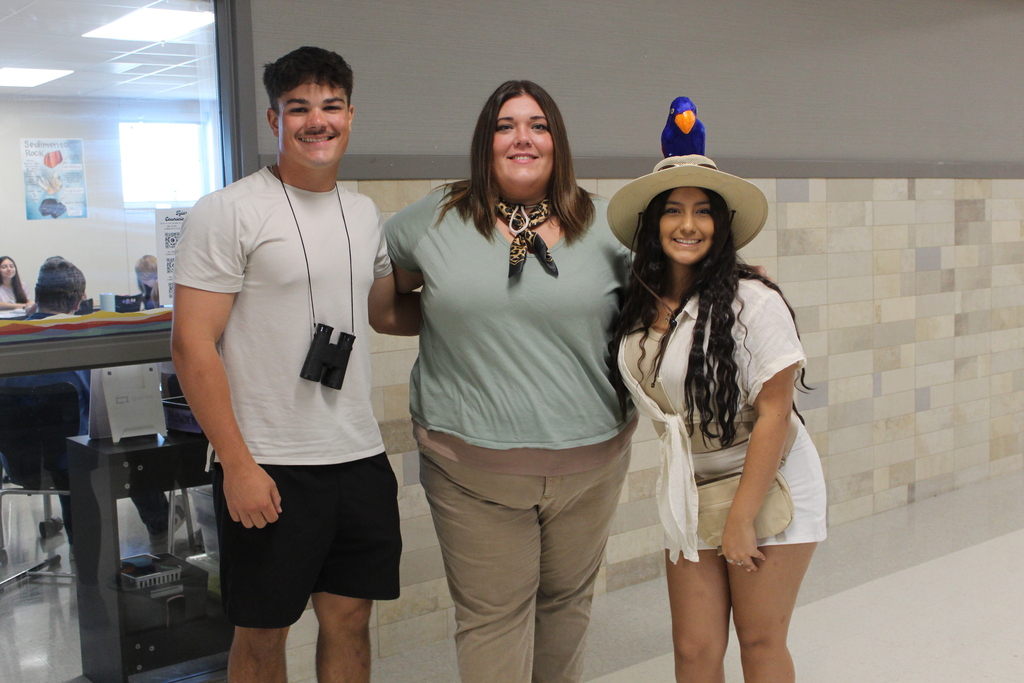 safari day at legacy highschool staff and students posing together in their outfits