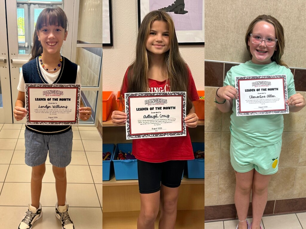 students holding certificates for leader of the month