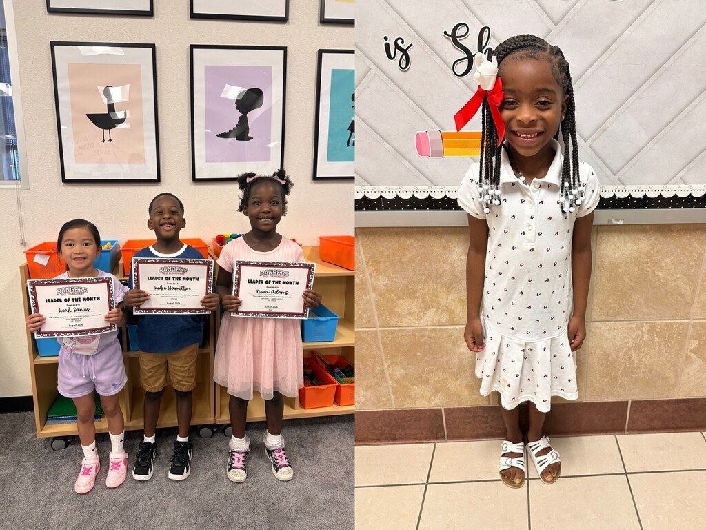 students holding certificates for leader of the month