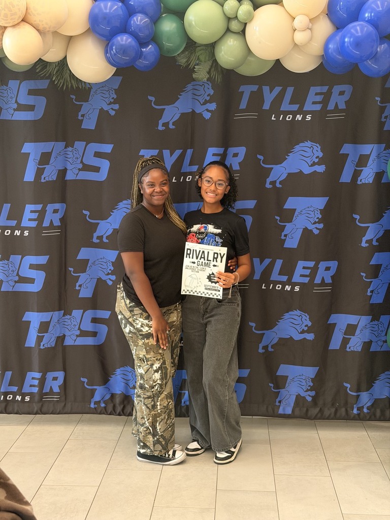 students posing with camo on